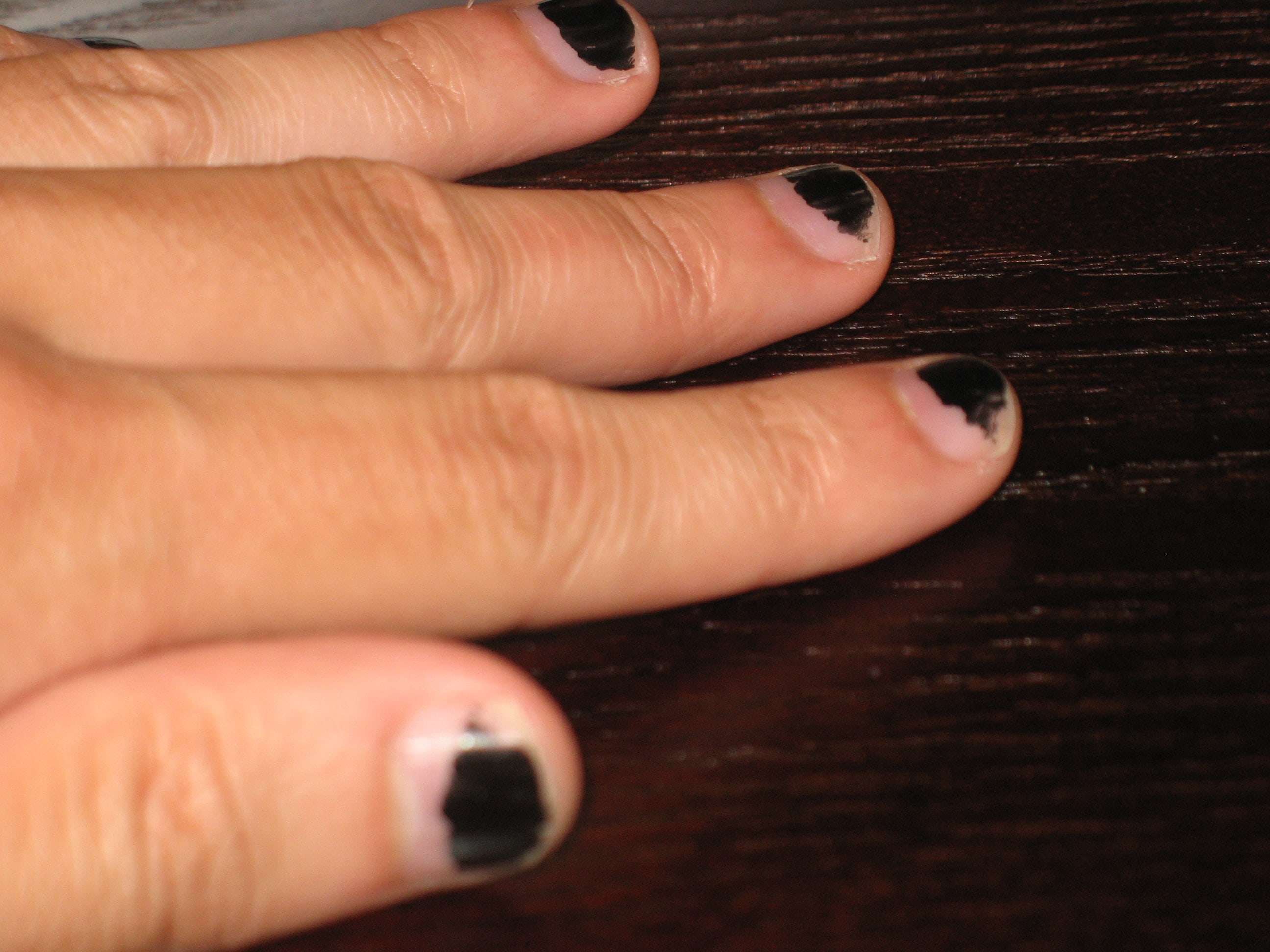 fading black emo nails
