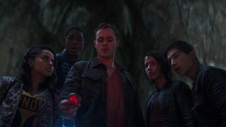 Power Rangers Gathered to Look at Stone